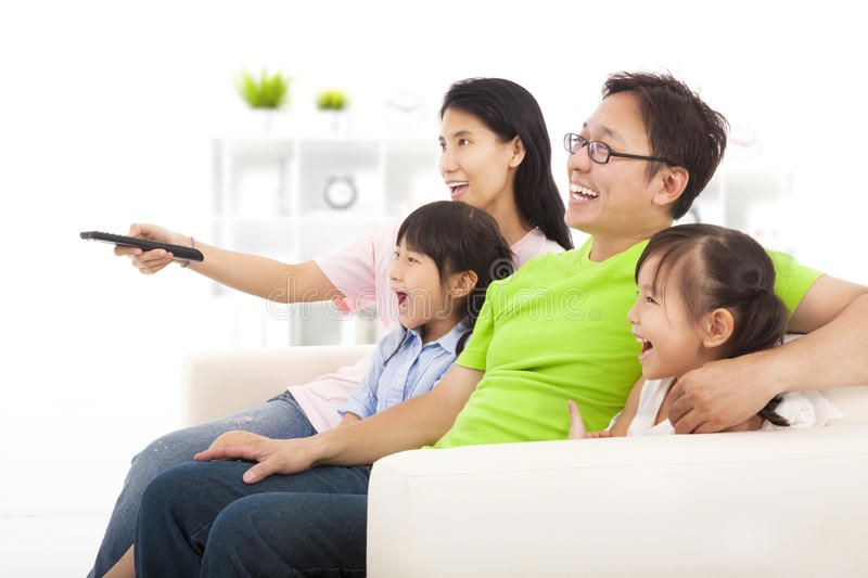 Watching Television Portrait Of Happy Family With Two Children Sitting On Sofa Ad Happy Family Portrait Streaming Tv Live Tv Streaming Good Movies
