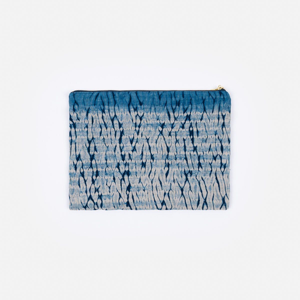 A compact flat pouch for your stationeries and makeup essentials crafted from our indigo dyed shibori fabric. • Outer material: indigo-dyed linen• Inner lining: indigo-dyed cotton canvas• YKK brass zipper Dimensions: • 7", 10" (approximately 18x25cm) • Please note that due to the handcrafted nature of our works each one is unique and the color/pattern may vary slightly from the images. Compact Flats, Shibori Fabric, Stationeries, Flat Pouch, Dyed Linen, Makeup Essentials, Indigo Dye, Wood Grain, Color Patterns