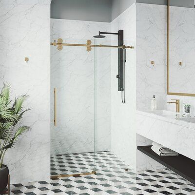 VIGO This adjustable frameless shower door is everything you want and need to complete your bathroom remodel. The sliding door has a fixed glass panel, made from 0.785" ANSI Z97.1 and 16 CFR 1201-certified clear tempered glass to resist dangerous breakage, shards, and streaks. Incredibly sturdy and stable, the door has top rail support that ensures wall anchoring and reinforces wall stability. Its rails are stainless steel tubes, built to withstand more than the required weight. In addition to t Vigo Shower Doors, Frameless Sliding Shower Doors, Glass Shower Doors, Sliding Doors, Glass Doors, Unique Shower Doors, Shower Door Handles, Modern Shower, The Door