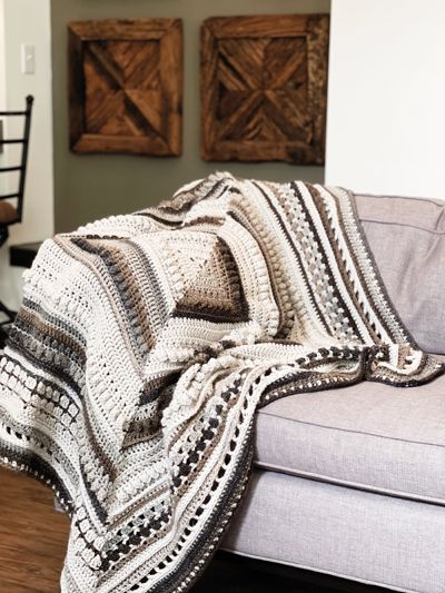 Worked from the center out, this mandala style blanket has just enough of a twist to keep things interesting while being totally approachable for confident crocheters. Cozy up under this comfy throw with your favorite cuppa joe! This pattern is made ... Knit And Crochet Now, Crochet Throw, White Crochet, Christmas Crochet Blanket, Crocheted Blankets, Crochet Shawl, Waffle Blanket, Afghan Blanket, Modern Crochet Blanket
