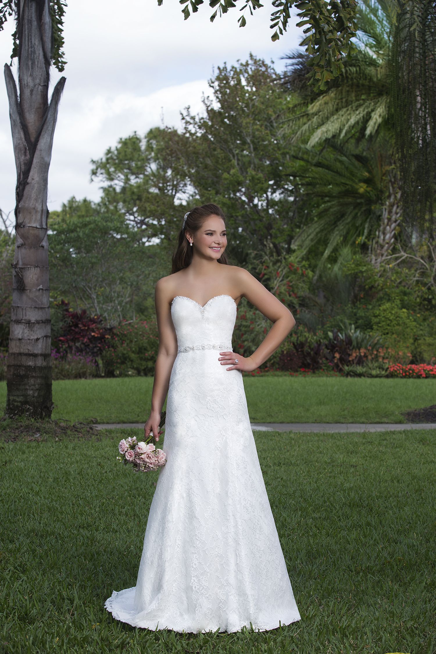 Charming fit and flare gown featuring a sweetheart crystal