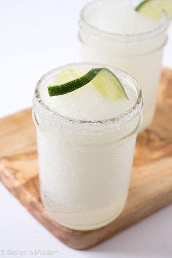 Frozen Lime Margaritas #frozenmargaritarecipes Frozen Margaritas - We all love frozen margarita recipes on a hot summer day! Skip the store-bought mixes and make your own! So much better and absolutely refreshing! If you are looking for frozen margaritas for a crowd, then simply double or triple the recipe! #frozenmargaritarecipes Frozen Lime Margaritas #frozenmargaritarecipes Frozen Margaritas - We all love frozen margarita recipes on a hot summer day! Skip the store-bought mixes and make your #limemargarita