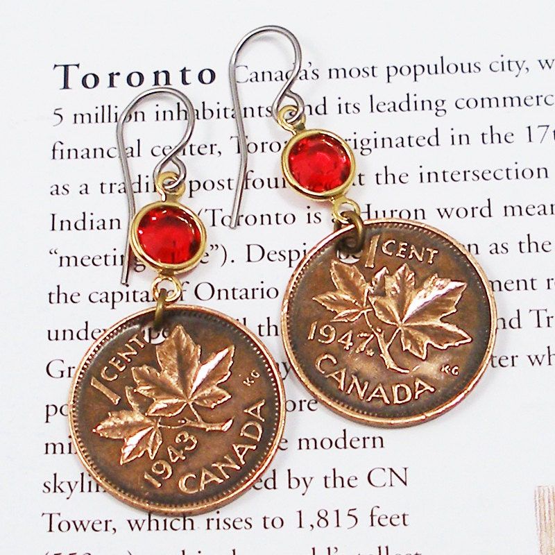 "The maple leaf is a proud and distinctive Canadian symbol. On February 15, 1965, the 11-point, red-maple leaf flag was inaugurated as the National Flag of Canada. Yet, maple leaves have been minted on Canadian coins as early as 1876. In 2013, the Royal Canadian Mint ceased minting the 1 cent coin. The estimated savings for taxpayers from phasing out the penny is $11 million a year. Whew ~that's a lot of pennies! These vintage 1-cent coins were authentic, circulated currency. They have deep, ric Coin Earrings, Coin Jewelry, Jewelry Crafts, Jewlery, Canadian Symbols, Canadian Coins, Us Penny, Lucky Penny, Maple Leaf Flag
