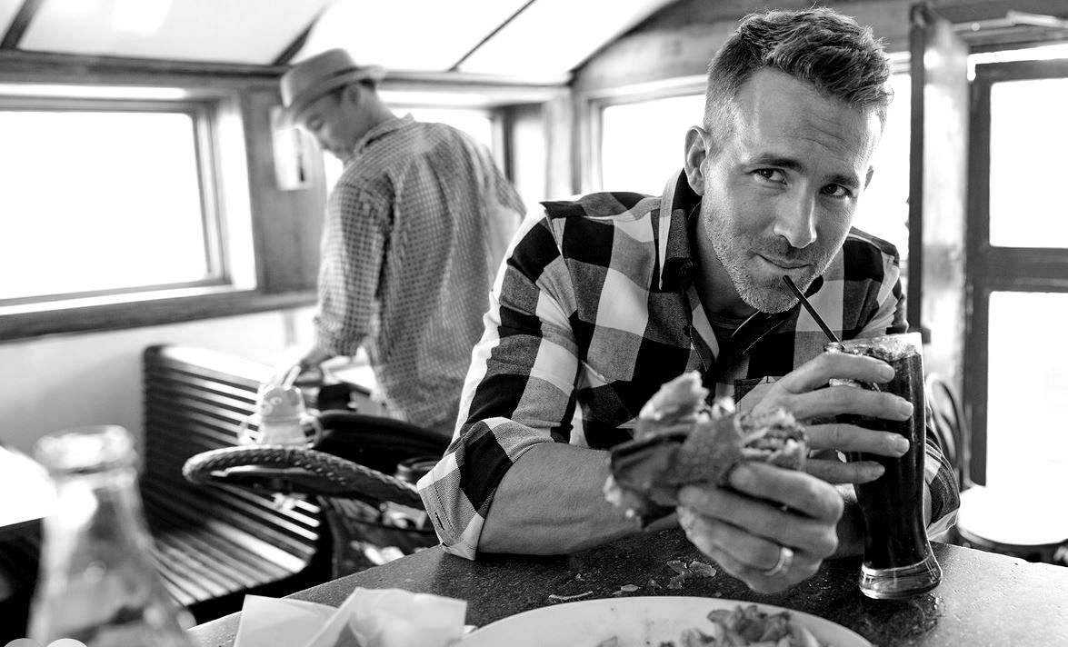 Ryan Reynolds Eating a Burger at a Restaurant Ryan Reynolds Eating a Burger at a Restaurant