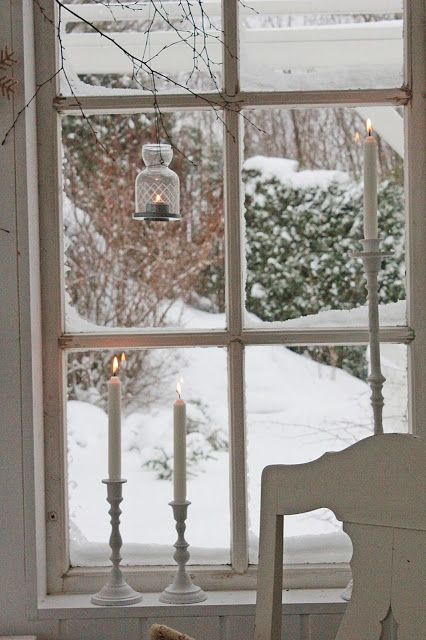 Snow Clinging To The Window Panes