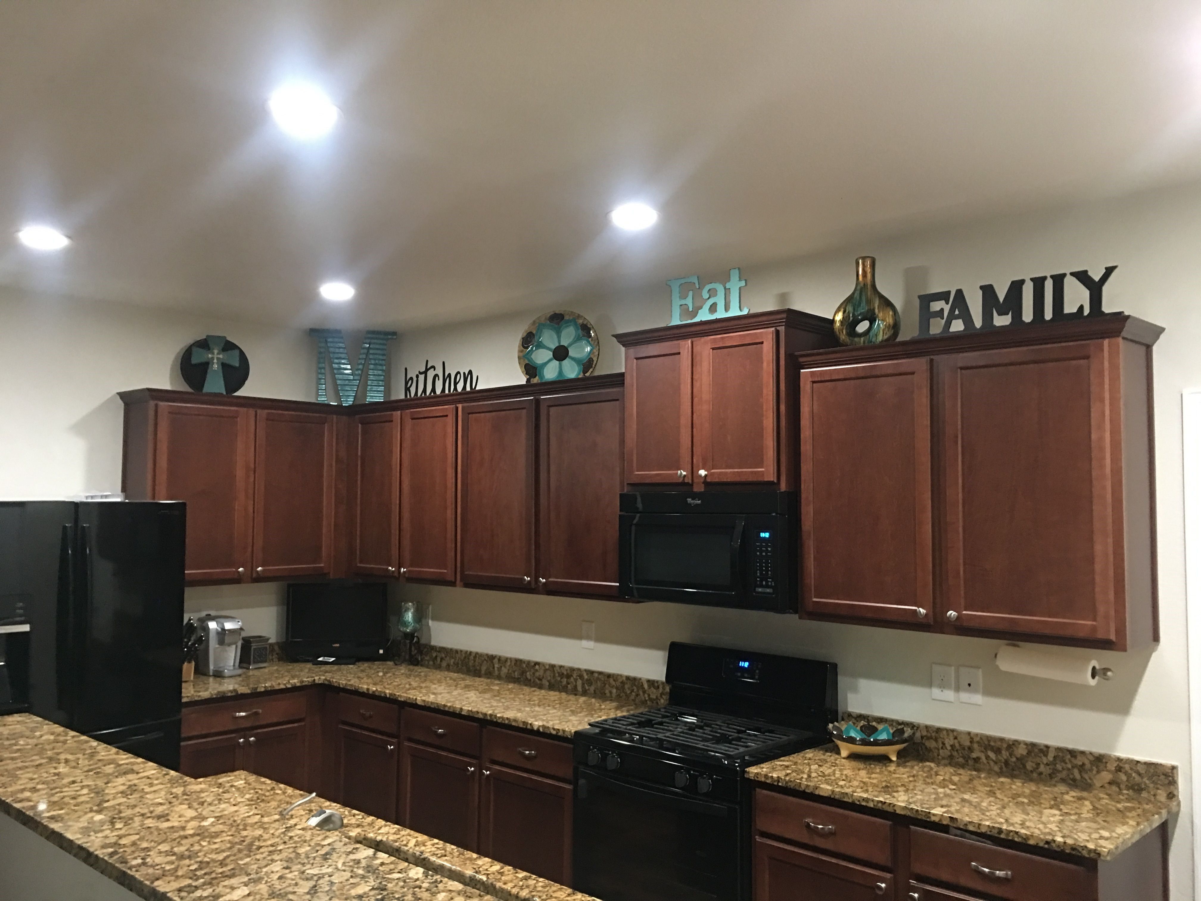 Above cabinet decor | Decorating above kitchen cabinets ...