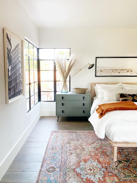 Caned Bed, Natural Bedding, Neutral Bedding, Gold Sconce, Oversized Nightstand, Neutral Master Bedroom, Oversized Art Print, Desert Art Print, Linen Bedding, Vintage Loloi Rug, Pampas, Woven Basket, Light Wood - Juniper Home Home Bedroom, Guest Bedroom, Bedroom Interior, Bedroom Furniture, House Interior, Interior Design, Bedroom Ideas, Farmhouse Bedroom, Boho Farmhouse