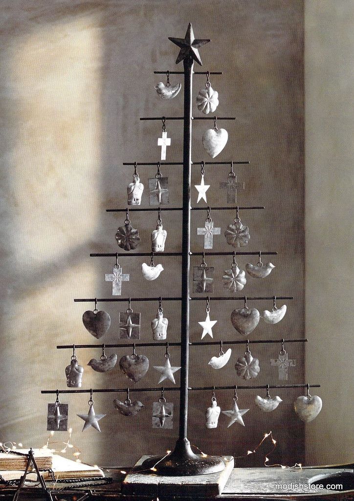 Our hand-crafted Milagro Tree is made of iron and adds a rustic flair to the holidays. Decorate with removable charm ornaments (included). Product Description • Product Dimensions: 19¾" L x 5¾" W x 31 Unique Christmas Trees, Easy Christmas Crafts, Holiday Tree, Rustic Christmas, Christmas Projects, Xmas Tree, Simple Christmas, Christmas Holidays, Christmas Decorations