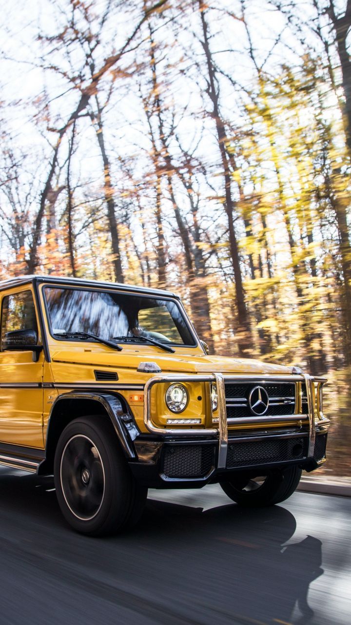 imposing wallpaper Mercedes-AMG G 63 on road yellow 7201280 wallpaper