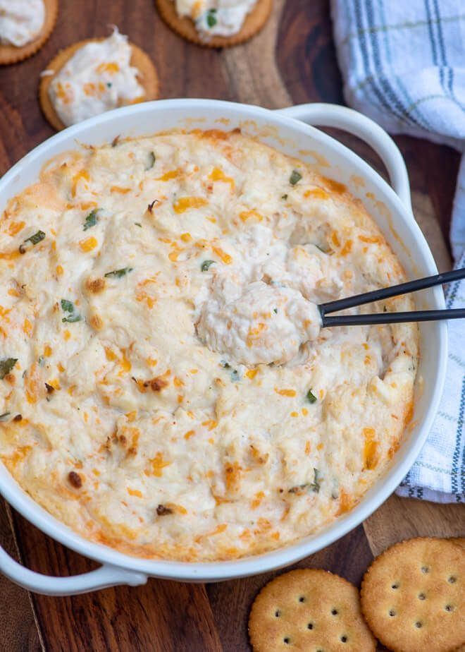 This Cheesy Hot Crab Dip is the ultimate party snack! Lump crab meat is