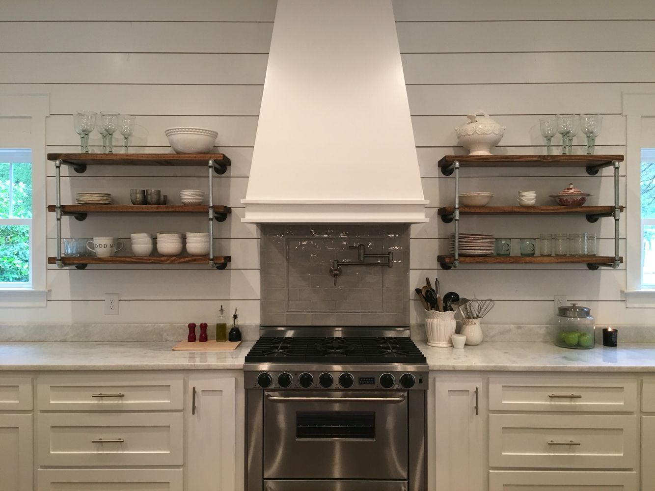 Custom built kitchen with floating shelves 