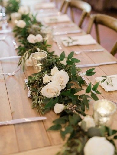 Cheekwood Wedding in Nashville, TN with lush, garden style flowers, white and green bouquets, pale blue bridesmaids dresses and rustic Italian details. We love this white and greenery floral inspiration! Greenery garland with flowers. Floral: Wildflowers LLC Photography: Taylor Dane Photography #weddingflowers #cheekwood #nashvilleweddings #organicflowers #bridalbouquet Wedding Table Flowers, Reception Flowers, White Wedding Flowers, Wedding Table Centerpieces, Greenery Wedding, Floral Wedding, Rustic Wedding, Wedding Decorations, White Flowers