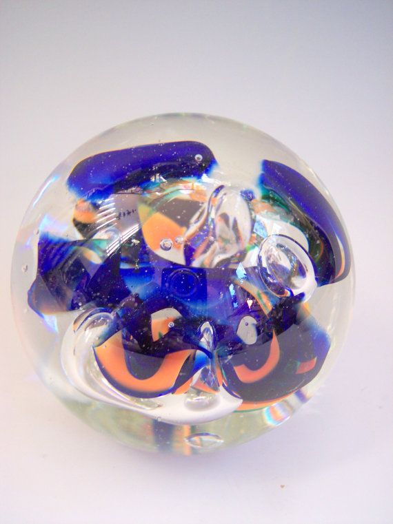 hand blown art glass paperweight in blue and orange by riker art