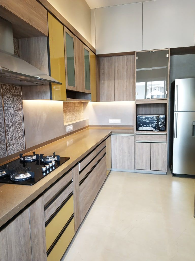 The sunny kitchen ar. aishani kumbhani built-in ki The sunny kitchen ar. aishani kumbhani built-in ki