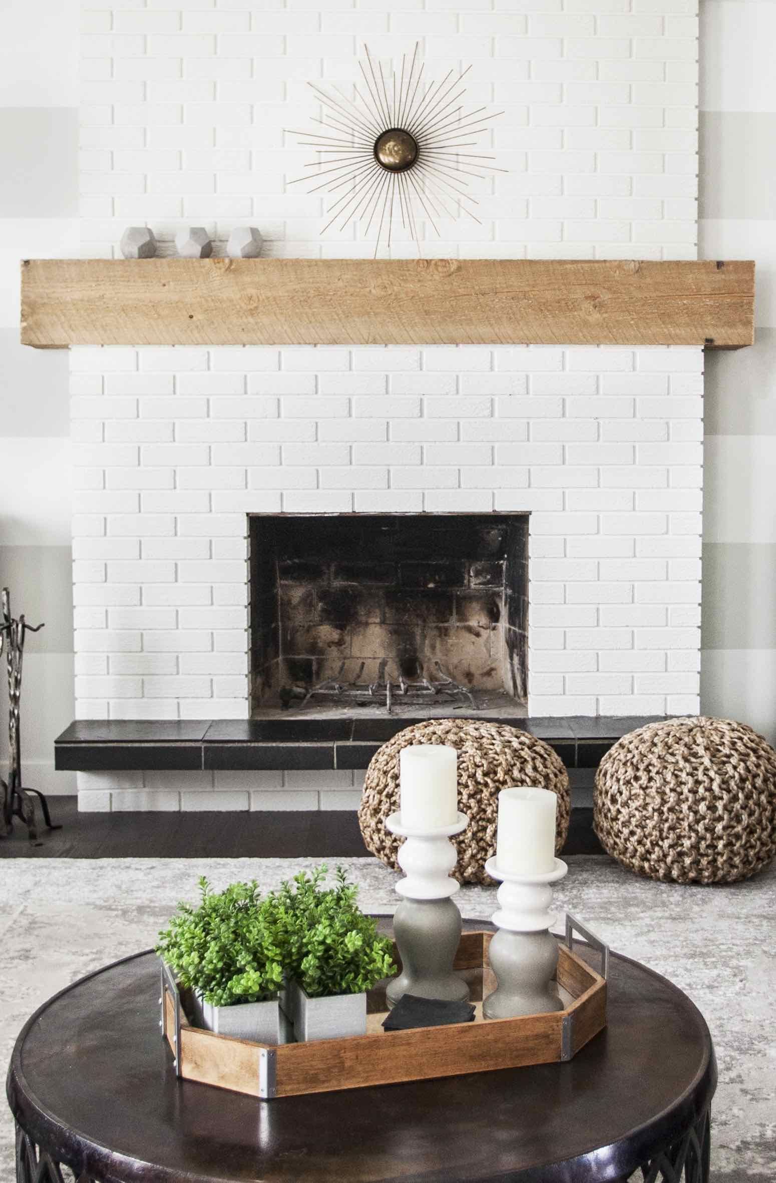 White Brick Fireplace. Like Mantel Style Extended past fireplace. 