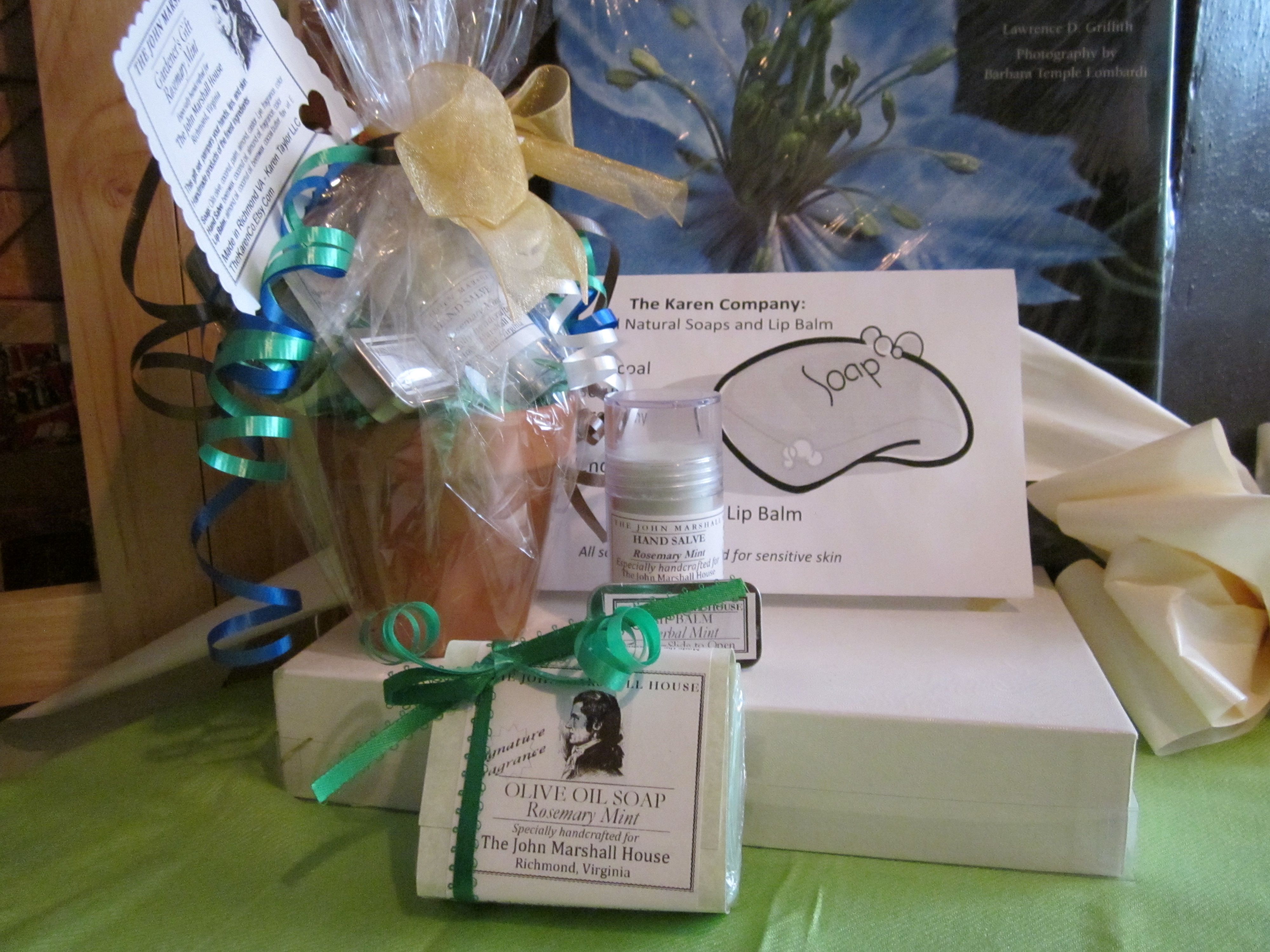 In appreciation for the 20 yrs of volunteerism offered to maintain the 18th c. herb garden, We worked with local artisan, Karen Taylor, of TheKarenCo.etsy.com, who created a signature scented soap, rosemary mint, for The John Marshall House and put it in our new gardner's gifts. The gift set contains: Rosemary Mint soap, herbal mint lip balm and rosemary mint skin salve in a terra cotta pot. Great for any gardener or someone dreaming about Spring! Experience them in our Museum Shop! 804-648-7998