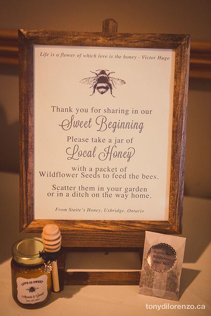 I like what this says and like the wildflower idea also with the scripture verse on the top..have the jars of honey on a table all together, with little bags of lemon candies for the children... Wedding Party Favors Cheap, Honey Jar Wedding Favors, Honey Favors, Creative Wedding Favors, Inexpensive Wedding Favors, Elegant Wedding Favors, Wedding Favors For Guests, Cheap Wedding, Wedding Ideas