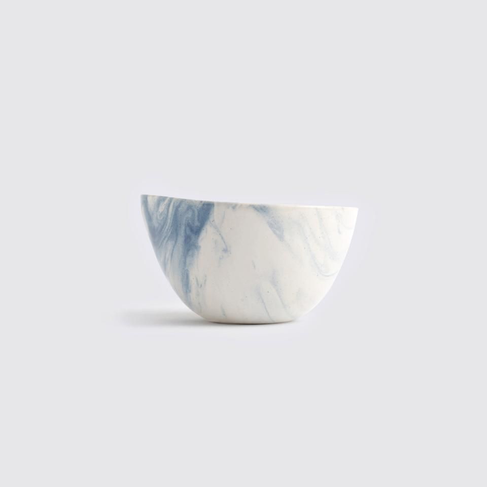 Inspired by the Sangam Point, the place where the Zanskar river meets the mighty Indus, this collection is an artistic rendition of this beautiful confluence. Glazed by hand with Ivory and Indigo, each bowl displays a unique blend. Diameter: 4.5 in. Height: 2.5 in. Material: Stoneware Wash and Care: Microwave and Dishwasher safe. Hand wash with mild detergents. Safe Food, Stoneware, Decorative Bowls, Glaze, Indigo, Detergents, Beautiful, Lovely, Tableware
