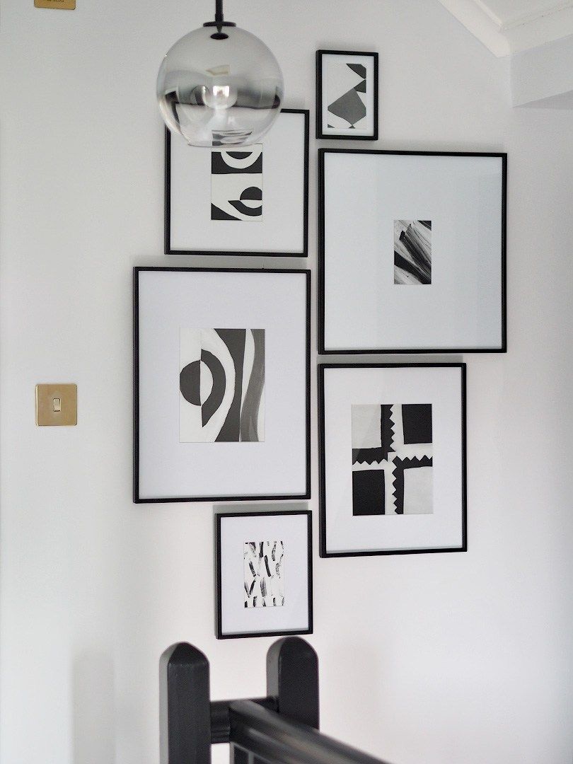 Revamp Restyle Reveal – Monochrome Hallway Makeover | Lust Living Black and White Gallery Wall Monochrome Hallway, Black Hallway, Tiled Hallway, Hallway Gallery Wall, Gallery Wall Frames, Hallway Pictures, Hallway Makeover, Narrow Hallway Decorating, Hallway Designs