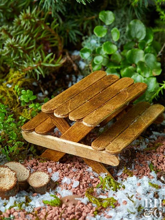 Make your fairy garden space extra special with this adorable picnic table! DIY this table with stained popsicle sticks. This project is super simple and adds tons of rustic character to a magical, tiny garden. #fairygarden #diy #miniatures #garden #fairy Fairy Garden Furniture, Fairy Garden Crafts, Fairy Garden Houses, Garden Projects, Gnome Garden, Garden Homes, Fairy House Diy Kids, Fairy Garden Bedroom, Fairy Garden Bird Bath