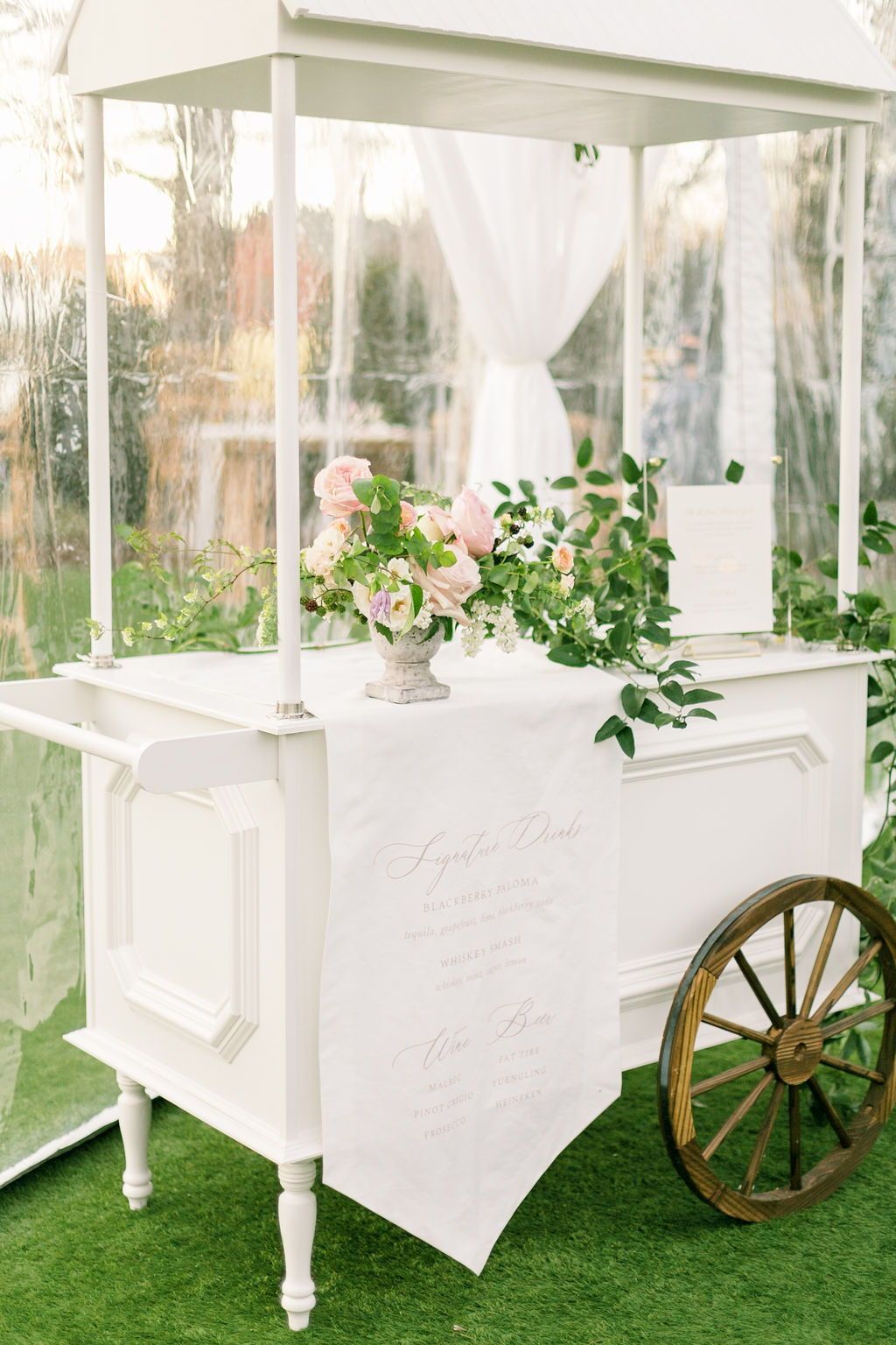 Classic and elegant champagne bar cart setup at the Merrimon-Wynne House Winter Bridal Showcase in Raleigh, North Carolina for a garden party vibe. A white linen fabric signature drink bar menu with blush lettering complements the wooden wheels and elegant greenery. Photo by Alaina Ronquillo Photography. Bespoke Wedding Invitations, Elegant Invitations, Wedding Stationary, European Wedding, Tuscan Wedding, Neutral Wedding, Wedding Modern, Wedding Bar Cart, Romantic Weddings