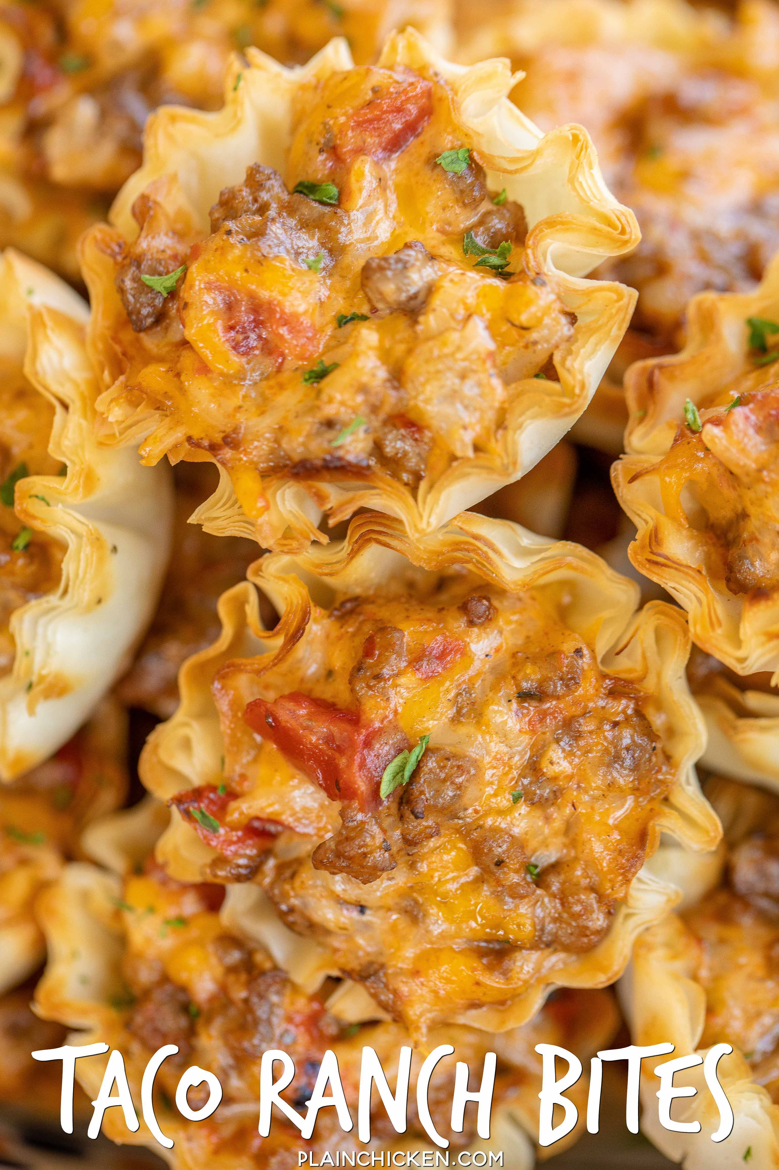Taco Ranch Bites - seriously delicious!! Only 6 ingredients! Ground beef, taco seasoning, diced tomatoes and green chiles, cheddar cheese, ranch dressing and phyllo tart shells. Can make ahead and refrigerate or freeze for later. I always have a batch in the freezer for a quick snack! Great for tailgating and parties! I never come home with leftovers. Everyone LOVES these cheesy taco bites. #tailgating #taco #beef #ranch #appetizer #partyfood #freezermeal #appetizersforparty Taco Ranch Bites - s #groundbeeftacos