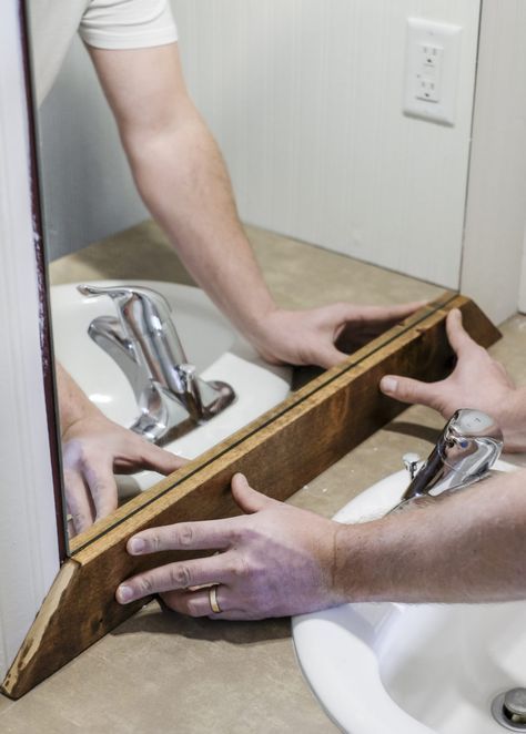 How to Add a DIY Wood Frame to a Bathroom Mirror #rusticbathrooms