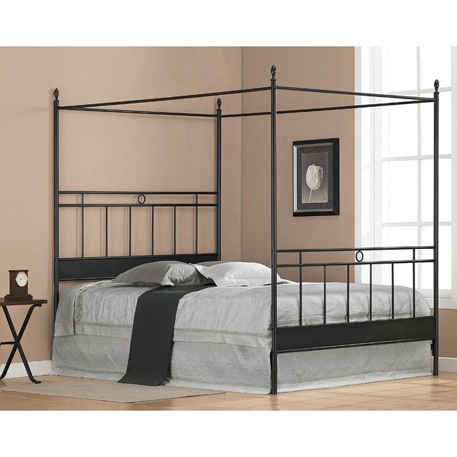 Black Metal Queen Size Canopy Bed The Frame Has Horizontal And Black Metal Queen Size Canopy Bed The Frame Has Horizontal And Vertical Bars