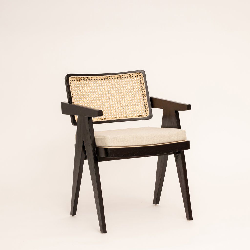 Inspired by the iconic design furniture of Pierre Jeanneret, our solid teak dining arm chair features a handwoven rattan cane seat & backrest. Also available in Natural. Linen Dining Chairs, Walnut Dining Chair, Cane Dining Chair, Black Dining Chairs, Mid Century Dining Chairs, Dining Room, Dining Table, Rattan Cane Chair, Caned Armchair