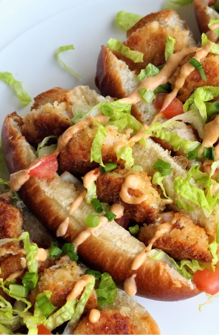 Cajun Shrimp Po' Boys are stuffed with lightly battered fried shrimp seasoned with Cajun spice then topped with a tangy romelaude sauce. These hoagies are quick, easy, and perfect for a summer time dinner. #shrimpseasoning
