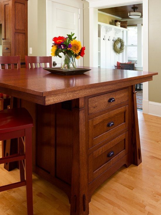 Craftsman style kitchen island with 3 sides of seating by marta #craftsmanstylehomes