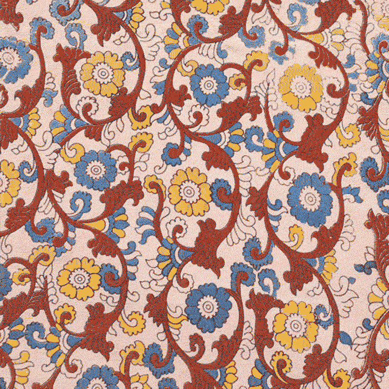 An Orange Yellow And Blue Floral Pattern On Fabric an-orange-yellow-and-blue-floral-pattern-on-fabric