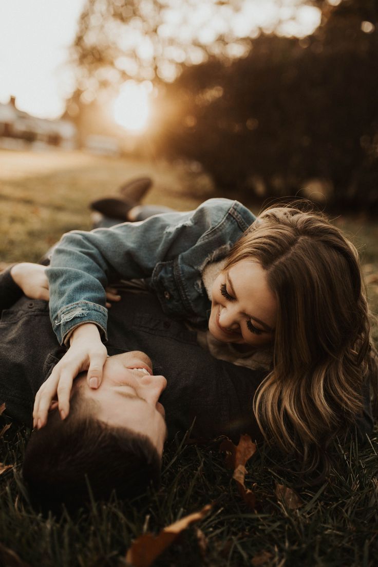 Perfect fall evening for an engagement session, with the golden sun and fallen l...