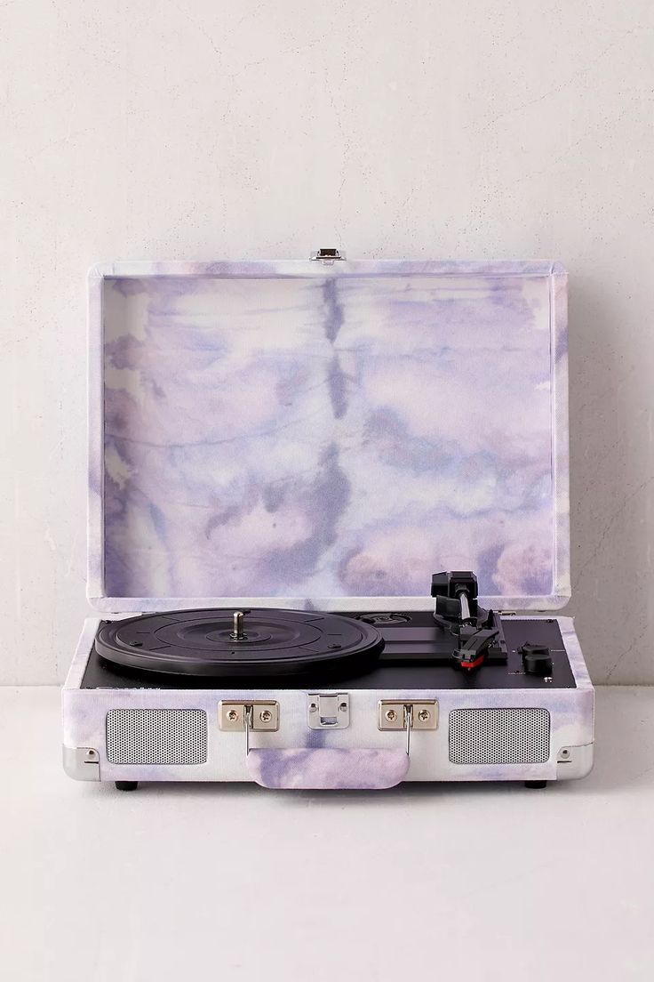 Bluetooth-compatible and portable vintage-inspired turntable housed in a dreamy purple tie-dye briefcase from the experts at Crosley. This entry-level record player is perfect for playing your favourite vinyl LPs, and comes complete with a headphone jack, RCA audio out, and features dynamic, full-range stereo speakers. Compatible with all portable audio devices and plays LPs: 33 1/3, 45 and 78 RPM. Bluetooth Record Player, Stereo Speakers, Record Player Urban Outfitters, 45 Rpm Adapter, Power Converters, Voltage Converter, Purple Fits, Audio Devices
