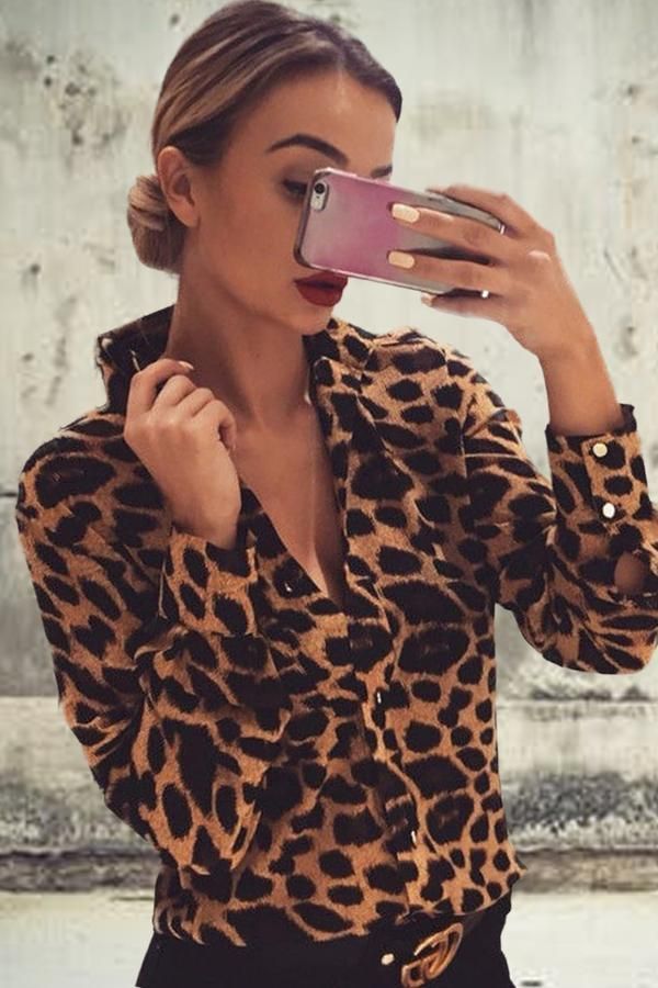 This one is hot fire! Our Untamed Leopard Blouse is a long-sleeve, button-down ...