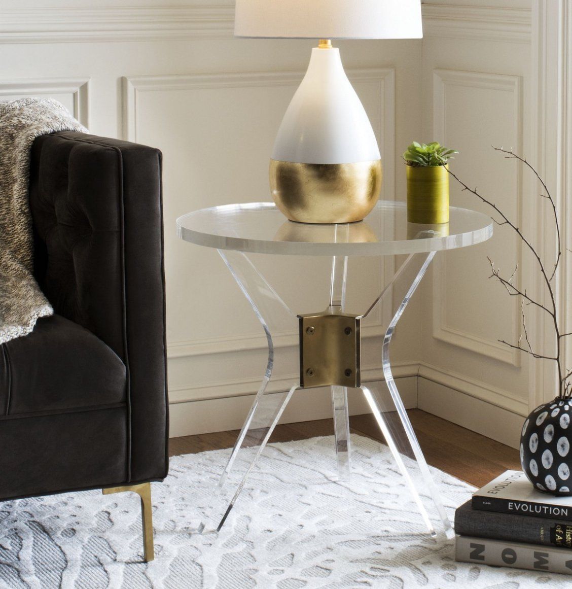 Add An Instant Designer Touch To Any Living Room With This Add An Instant Designer Touch To Any Living Room With This Contemporary Acrylic End Table Boasting High Style Its Bold Metallic Br Detail And