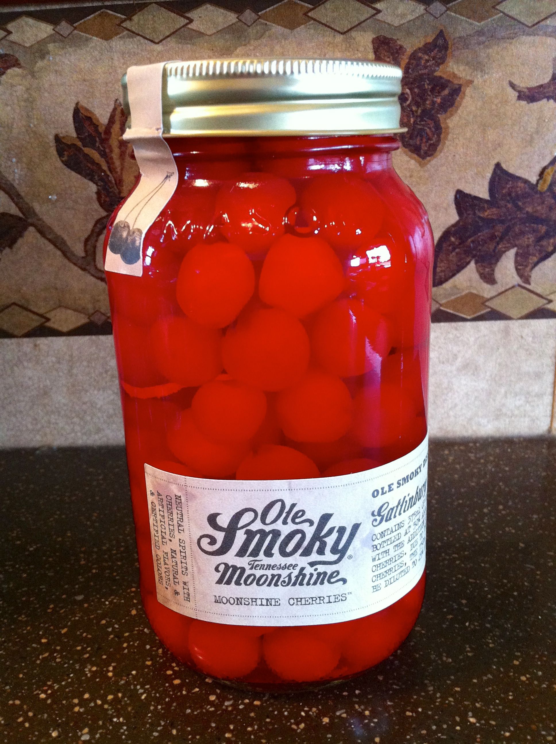 Chocolate covered Moonshine cherries and vanilla cream Chocolate covered Moonshine cherries and vanilla cream