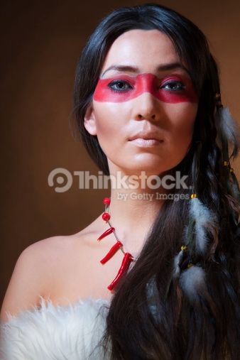 American Indian With Paint Face Camouflage Studio Photo With