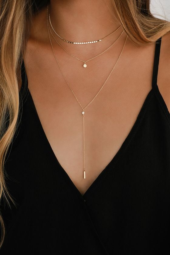 Lulus Exclusive! The Lulus Coretta Layered Gold Necklace is here to make your outfit perfect! Three layers of dainty gold chains, embellished with a row of round charms, a circle charm, and a drop chain embellished with a single rhinestone and bar charm, all come together to create a simple yet sweet look. Lobster clasp closure. Shortest necklace measures 13" long, with 4" drop chain, and a 2. 25" extender chain. Man made materials. Imported. Lulus | Coretta Layered Gold Necklace. Stylish Jewelry, Cute Jewelry, Jewlery, Dainty Gold Jewelry, Dainty Jewelry Necklace, Delicate Necklace, Simple Jewelry, Casual Jewelry, Jewelry Outfit