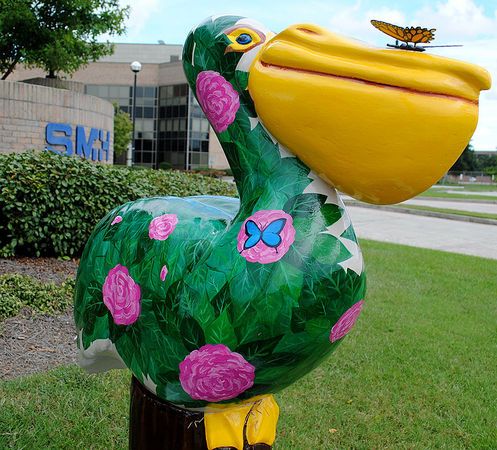 Olde Towne Slidell Pelicans on Parade flock party postponed Pelican