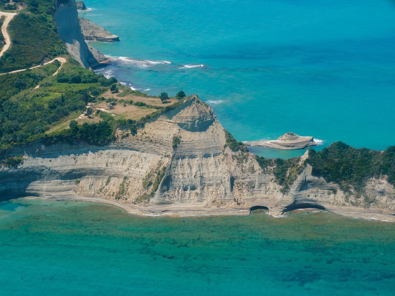 Sidari beach is long, sandy and well organized. Located right next to the famous Canal d' amour. https://greece.terrabook.com/corfu/page/sidari-beach #Greece #Corfu #terrabook #GreekIslands #TravelTips #Travel #GreeceTravel #GreekPhotos #Traveling #Travelling #Holiday #Summer Corfu, Greece Travel, Greek Islands, Oh The Places Youll Go, Terra, Monument Valley, Travel Tips, Canal, Natural Landmarks