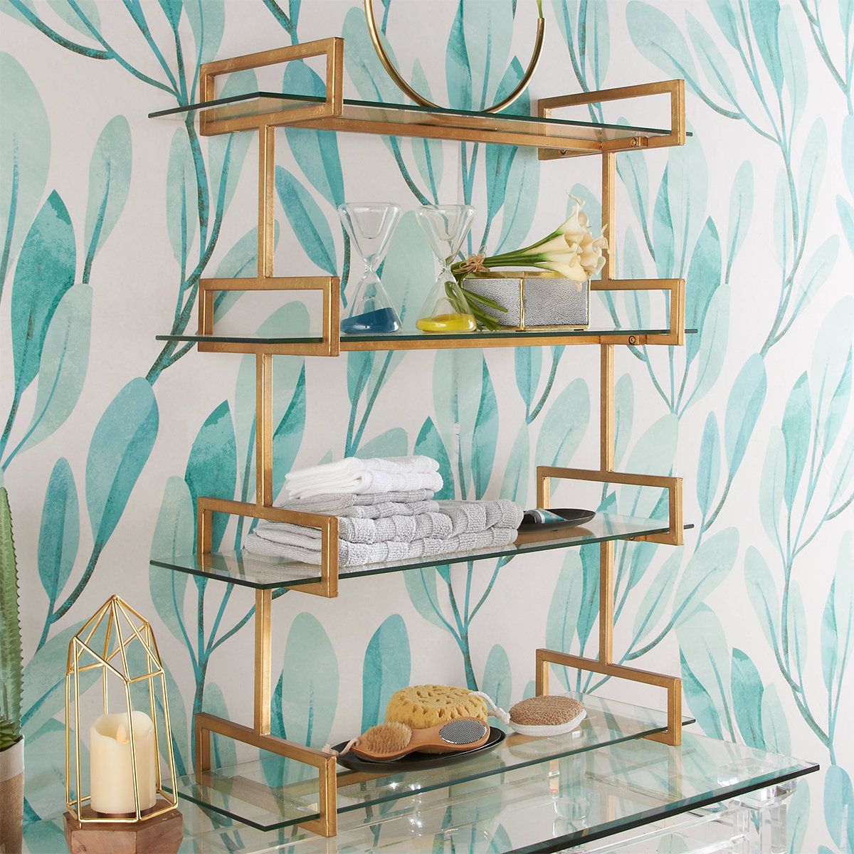 This floating glass shelf jazzes up a wall, whether in a bedroom, living room, bathroom, or hallway! Accented with squared off edges, the iron is finished with gold leaf. The four shelves offer the perfect spot for any of your belongings to be displayed. Glass Display Shelves, Glass Corner Shelves, Glass Shelf Brackets, Wine Glass Shelf, Glass Shelves In Bathroom, Floating Glass Shelves, Gold Shelves, Metal Shelves, Bar Shelves