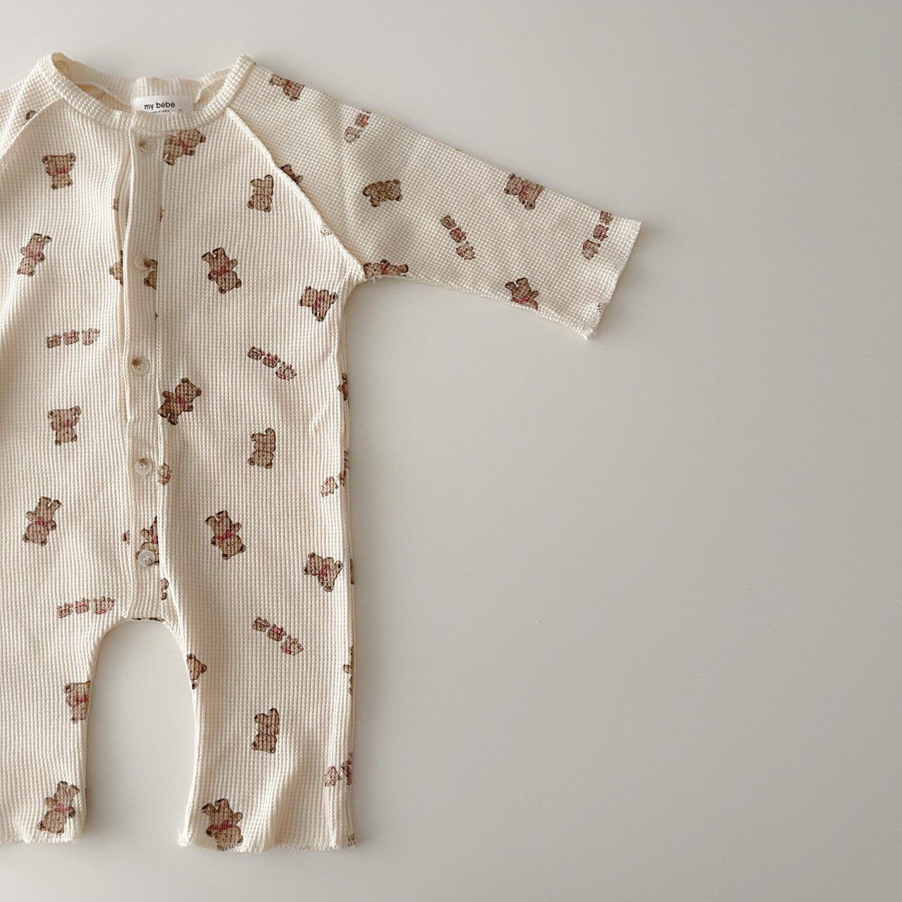 A lightweight long sleeved button up waffle romper featuring soft, neutral shapes printer all over. Mom Care, Effortless Style, 18 Months, Waffles, Printer, Button Up, Neutral, Teddy Bear, Rompers
