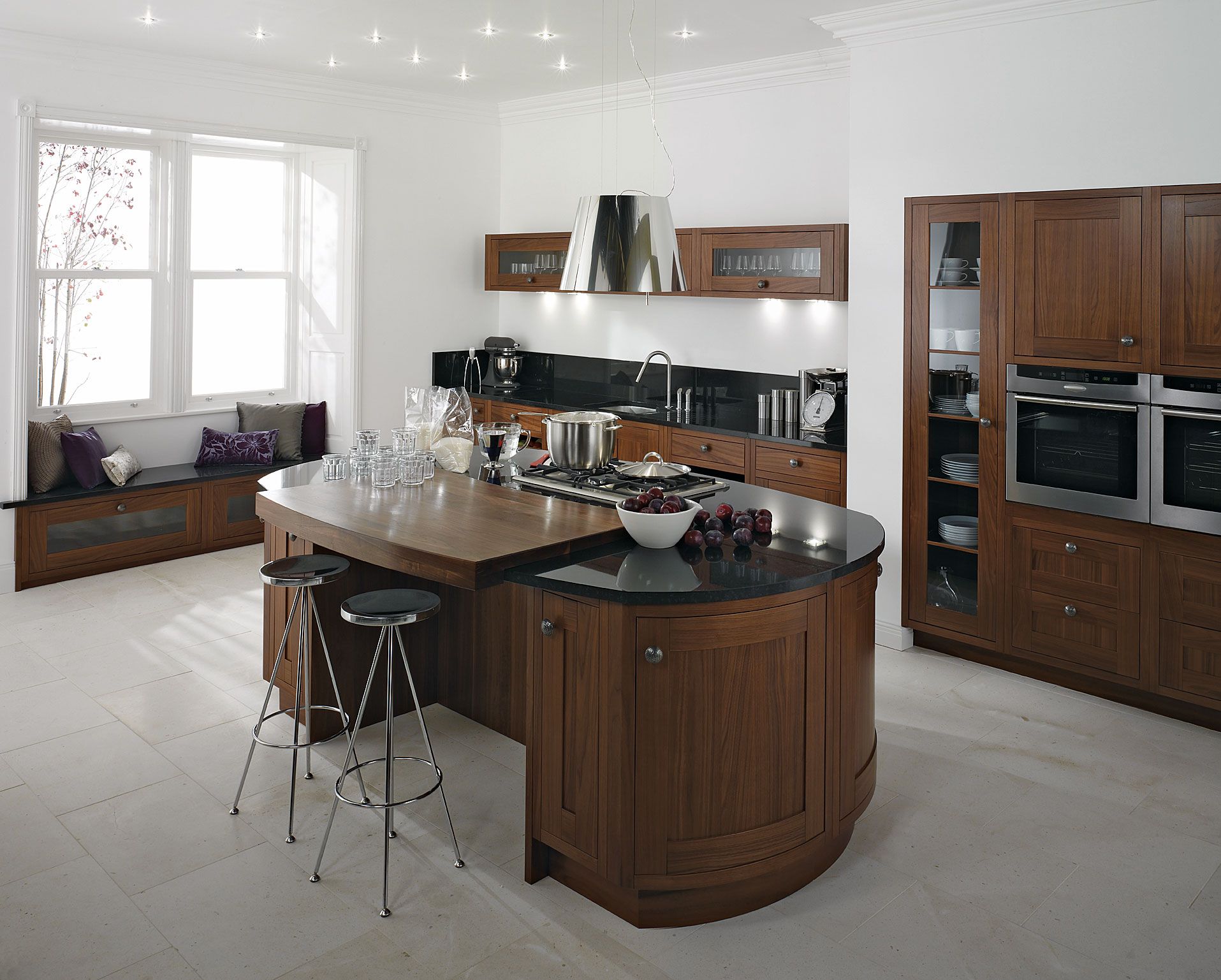 Cly Black Oval Granite Tops Kitchen Island With Seating Of Round Cly Black Oval Granite Tops Kitchen Island With Seating Of Round Backless Stools On White Tiles Floors And Brown Cabinet Set In Large Open