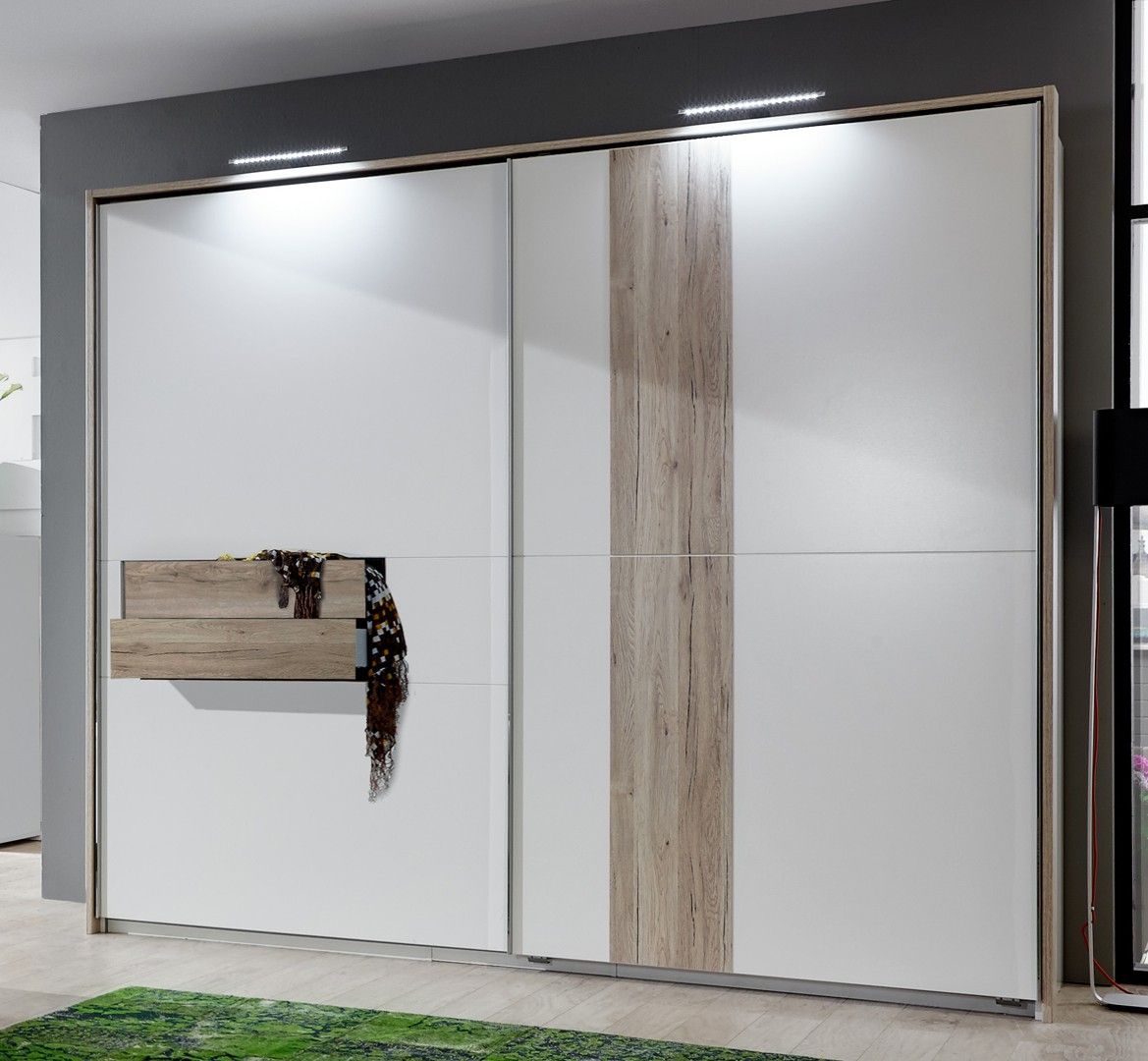 Armoire design portes coulissantes coloris chêne/blanc alpin Evita III Armoire design portes coulissantes coloris chêne/blanc alpin Evita III