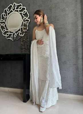 Grace Yourself This Wedding Season With These Trendy Gharara Collection Paired With Beautiful Colors Along With Calming Embroidery In Georgette Fabric And Stylish Net Dupatta. Designer Sarees Online, Designer Dresses, Indian Dresses, Indian Outfits, White Punjabi Suits, Sharara Suit, Salwar Kameez, Salwar Suits Party Wear, Georgette Dress