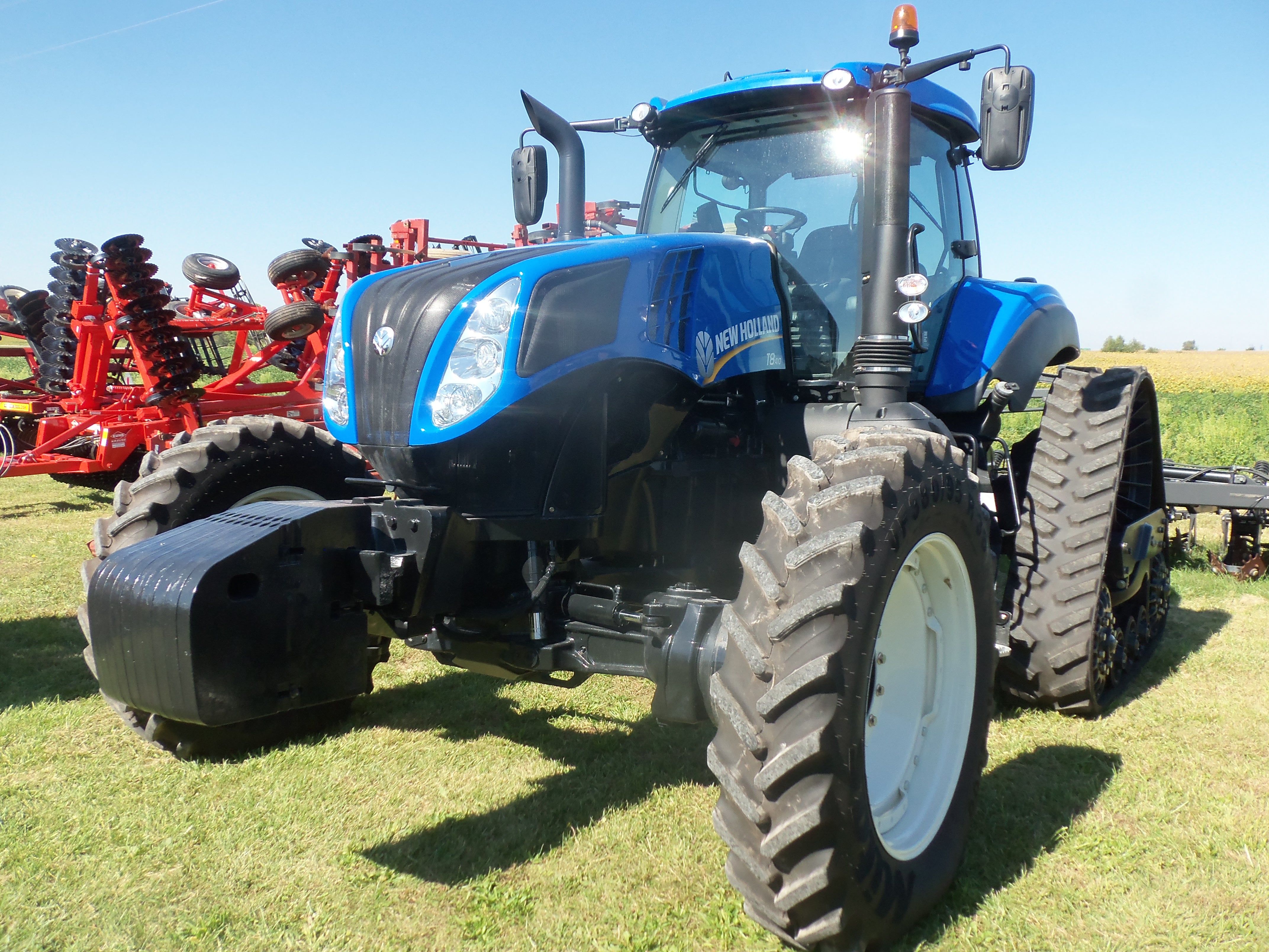 New Holland T8410 with rear tracks.