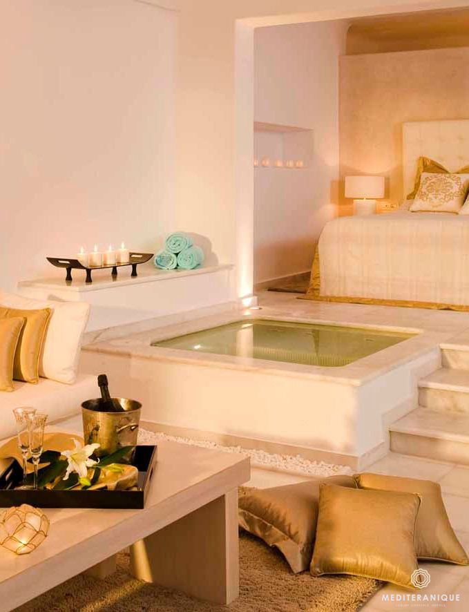 A Luxurious Suite With An Indoor Jacuzzi At The Andromeda Gold Suites Santorini Luxury Hotel Room Hotel Interiors Indoor Jacuzzi