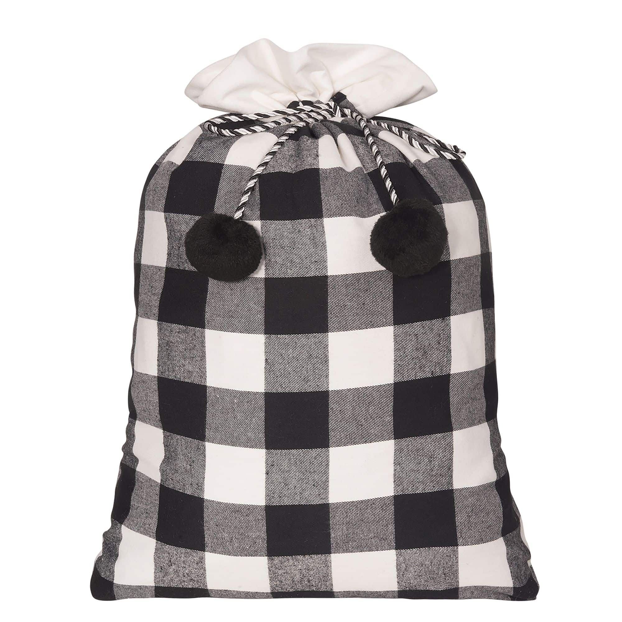 "Buy Black & White Buffalo Check Santa Bag, 20\" x 28\" at Michaels. com. The design of a traditional Santa bag but with a twist! The design of a traditional Santa bag but with a twist! This Santa bag is perfect for delivery presents to your next holiday gathering, giving a gift or simply displaying it by the Christmas tree. The Buffalo Check Santa Bag features a white and black buffalo check pattern, a white low pile fur cuff, and rope drawstring with black pom-pom ends. Details: Black and whit Glam Christmas Decor, Christmas Musical, Christmas Beauty, Farmhouse Christmas Decor, White Christmas, Christmas Ideas, Parents Christmas, Christmas Mantles, Christmas Inspiration