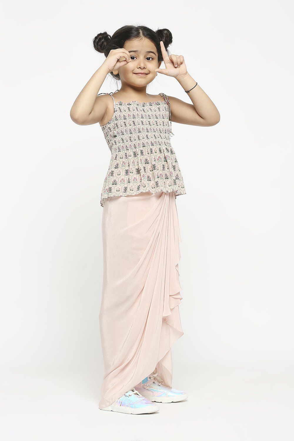 Editor's Note Printed Crop Top With Bobin Elastic Paired With Draped Skirt Color: Pink Fabric: Crepe Care: Dry Clean Only About the Designer Soup by Sougat Paul The brand has stood out for its Offbeat state-of-the-art and prints with unique mixing of colors, in silhouettes made to embrace and celebrate Feminity. It aspires to cater to that perfect ensemble to every woman who wishes to endorse beauty /Feminity/confidence and a dash of eccentric quirk all put together. Draped Skirt, Lace Skirt, Print Crop Tops, Personal Shopping, Offbeat, Eccentric, Pink Fabric, Every Woman, Silhouettes